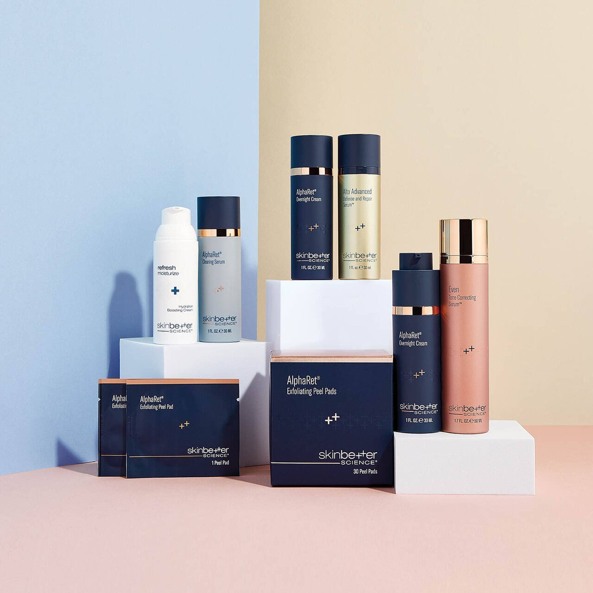 At Refresh MedSpa in Cape Coral FL, skinbetter science skincare bottles, jars, and boxes sit on a pastel pink and beige display.